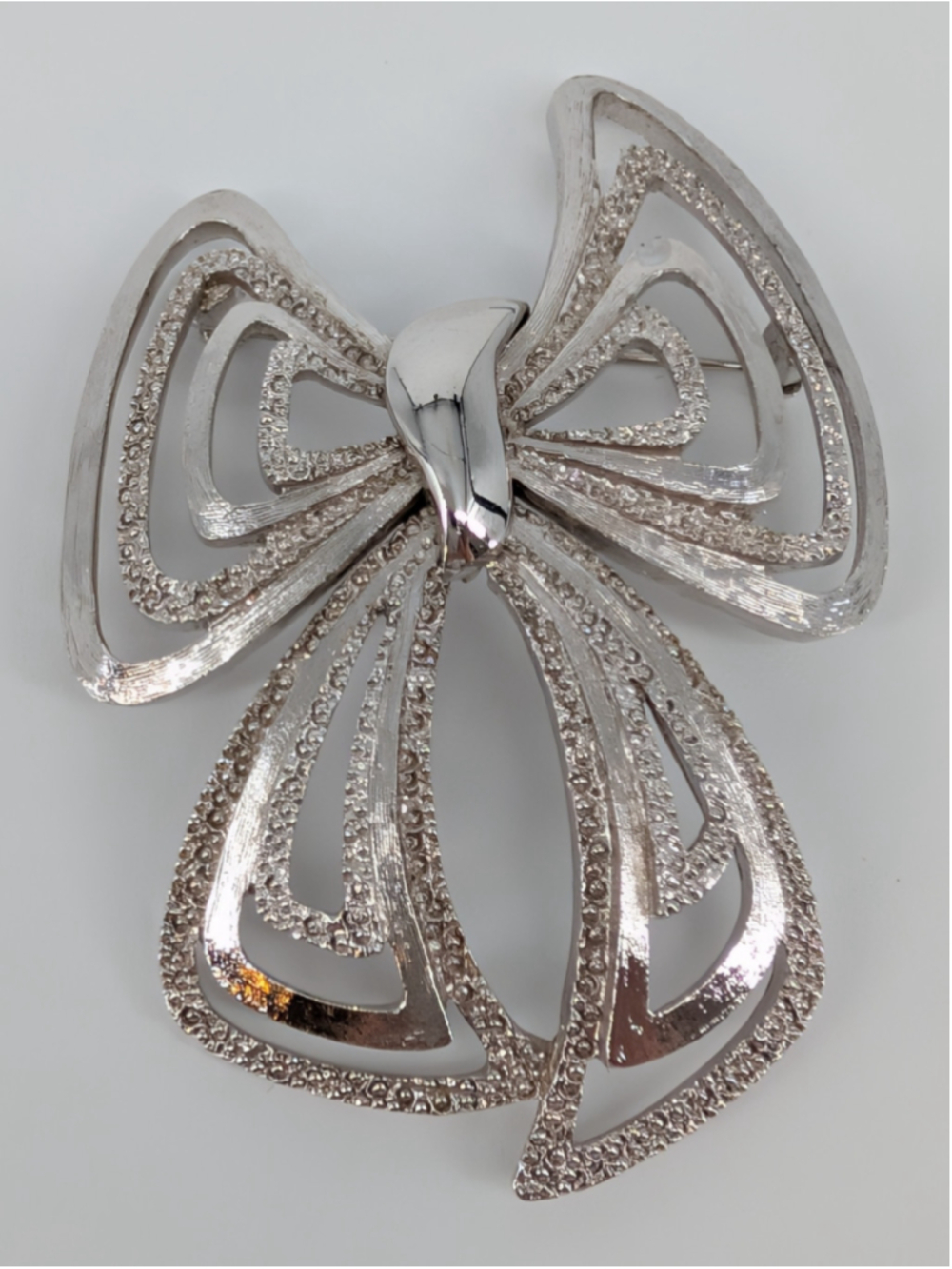 Vintage Monet SilverTone Bow Brooch Large Openwork Ribbon Statement Pin Brooched